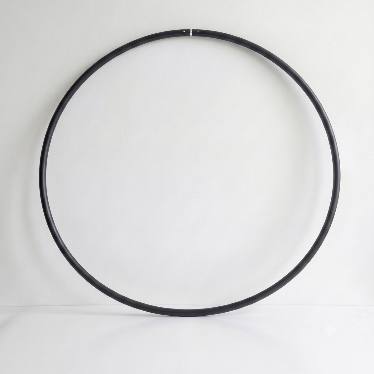 B108 professional mid-weight dance and fitness hula hoop in Obsidian Black classic untaped finish, handmade in Sydney from recycled plastic.