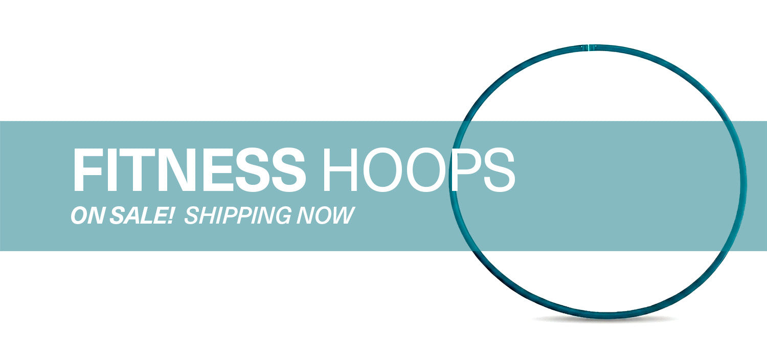 Hoop Empire homepage banner featuring a deep teal weighted fitness hula hoop. White text on a teal background reads: FITNESS HOOPS ON SALE! SHIPPING NOW